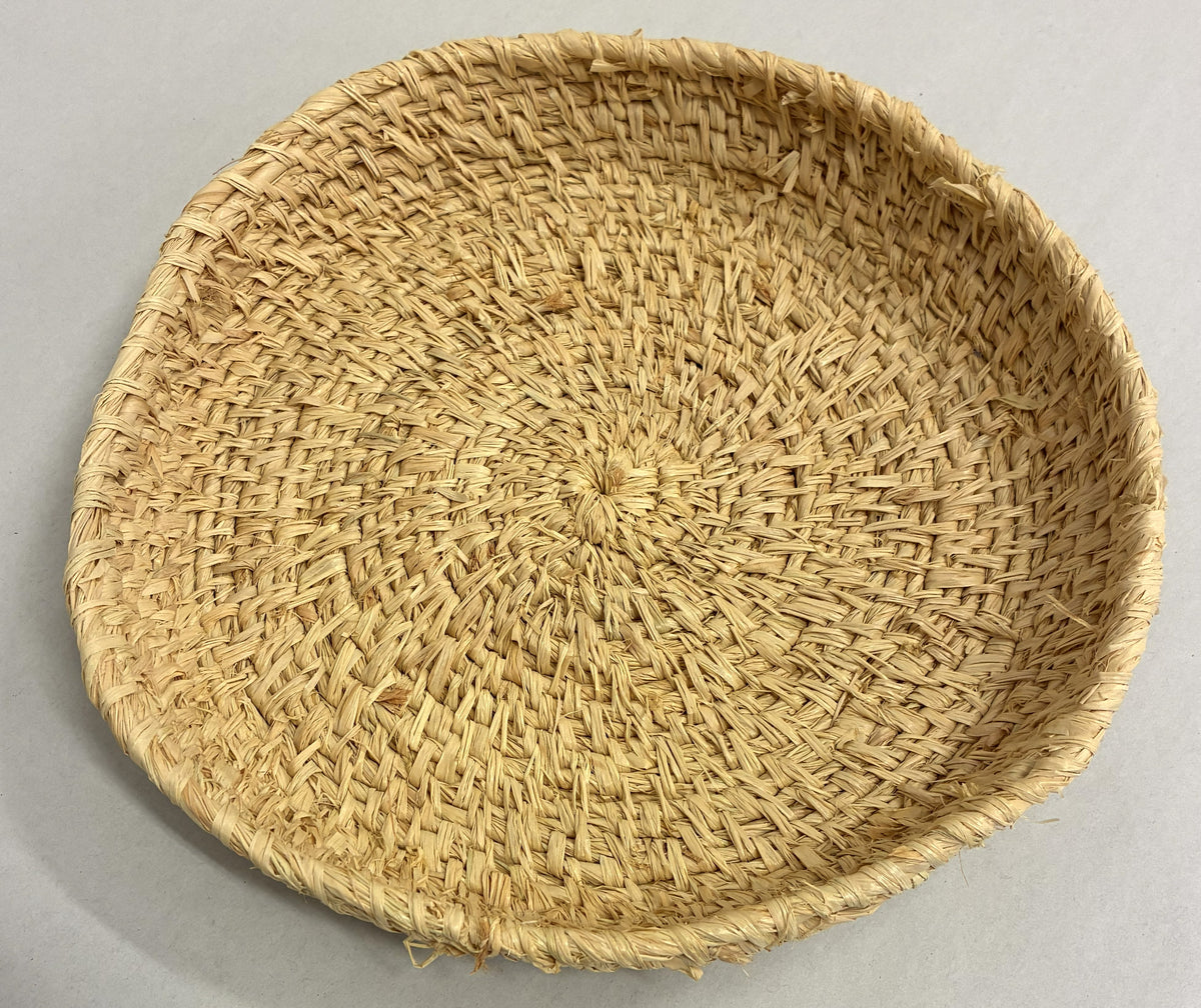 318-26 Hand Woven Basket. 26cm diameter, natural fibres and dyes.