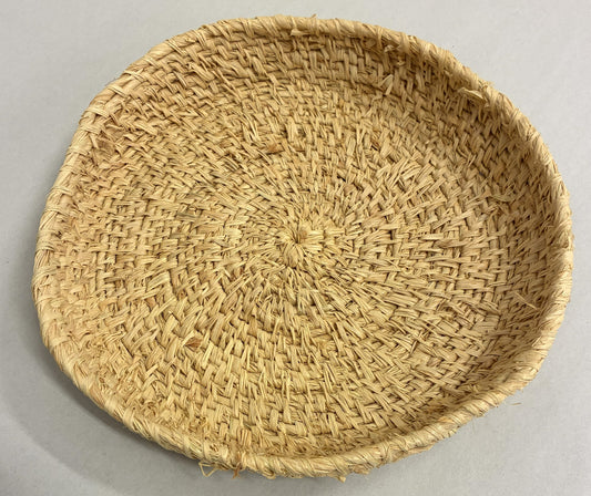 318-26 Hand Woven Basket. 26cm diameter, natural fibres and dyes.